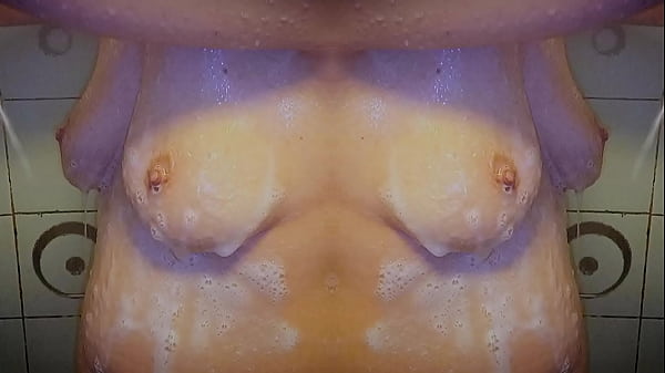 Reflection Of A Mature Goddess Under The Waterfall