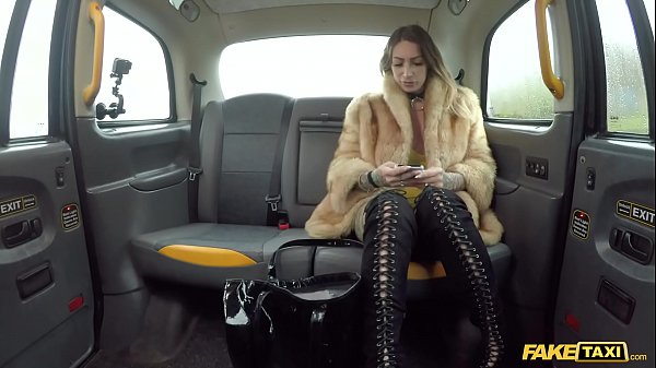 Ava Austen Gets Stuffed By A Massive Black Dildo In The Back Of A Fake Taxi
