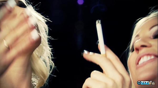 Sultry Blondes Entwined, Sharing Smokes And Caressing Thighs