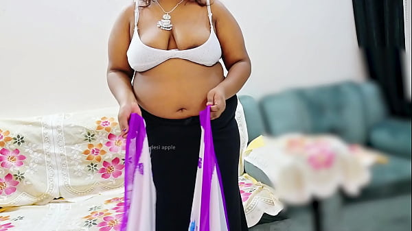 Indian Bhabhi Flaunting Her Curves In A Tight Saree, Teasing With Every Move